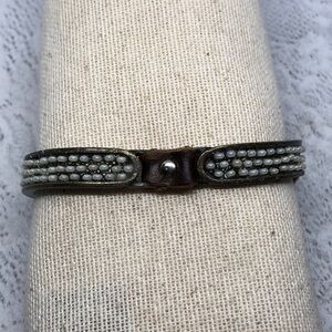 Rebel designs leather and pearl boho style bracelet.